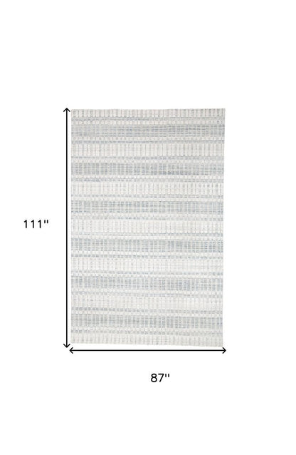 7' X 9' Ivory And Blue Striped Hand Woven Area Rug