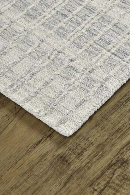 7' X 9' Ivory And Blue Striped Hand Woven Area Rug