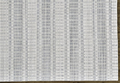 7' X 9' Ivory And Blue Striped Hand Woven Area Rug