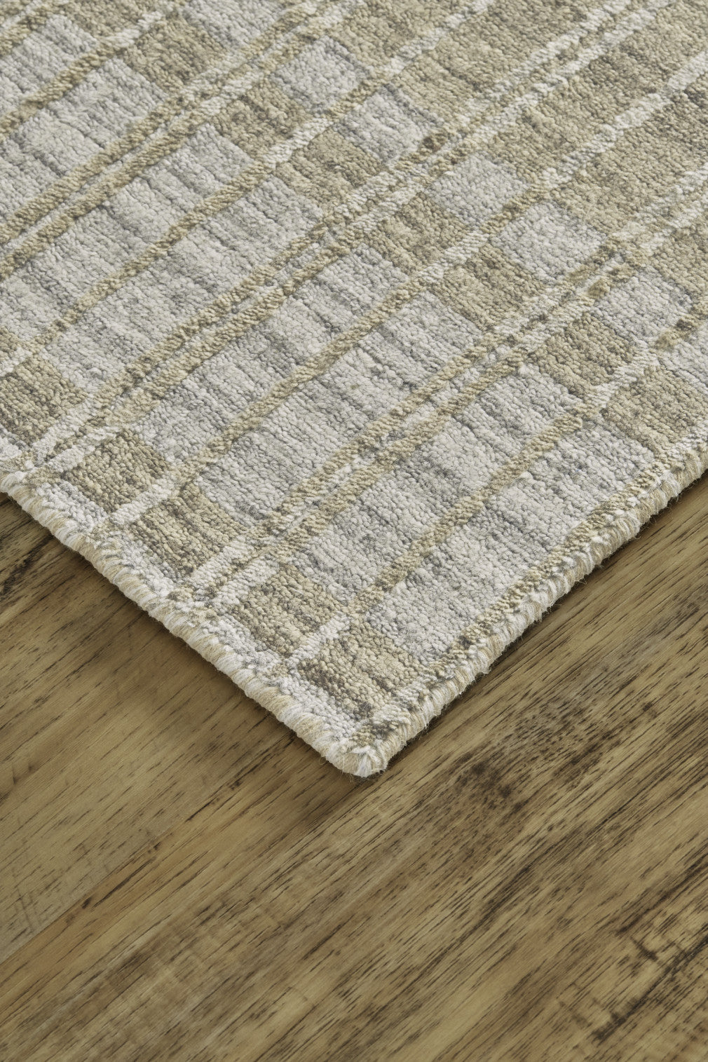 5' X 8' Ivory Taupe And Tan Striped Hand Woven Area Rug