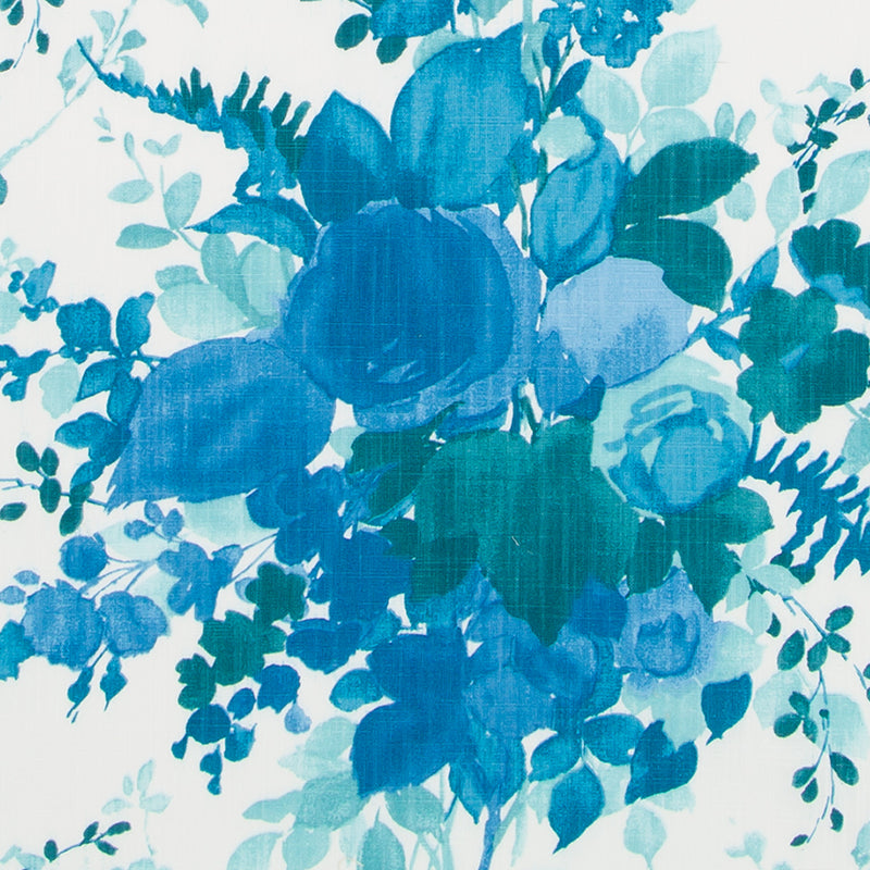 Blue watercolor floral fabric with turquoise leaves and blossoms; soft botanical pattern for apparel or home decor.