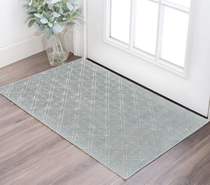 8' X 11' Taupe Ivory And Tan Wool Abstract Tufted Handmade Area Rug