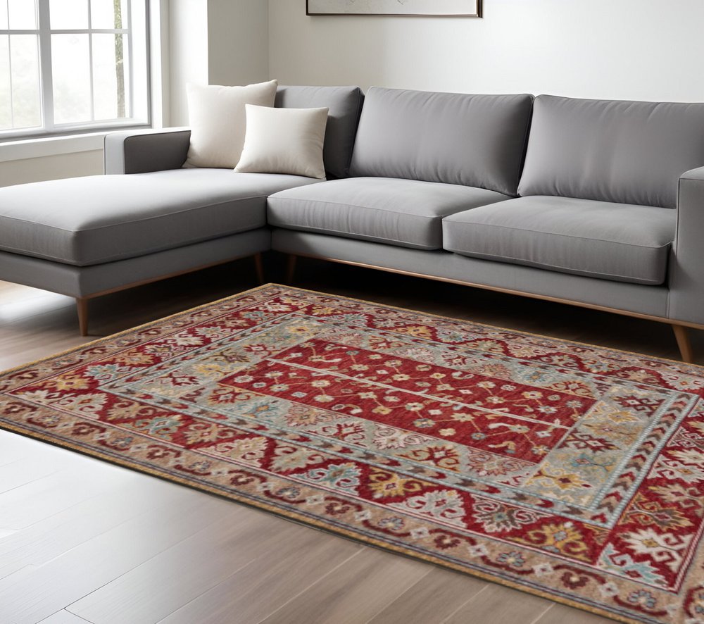 5' X 8' Red Blue And Brown Wool Floral Hand Knotted Distressed Stain Resistant Area Rug With Fringe