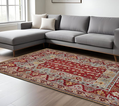 8' X 10' Blue and Red Wool Floral Hand Knotted Distressed Area Rug With Fringe