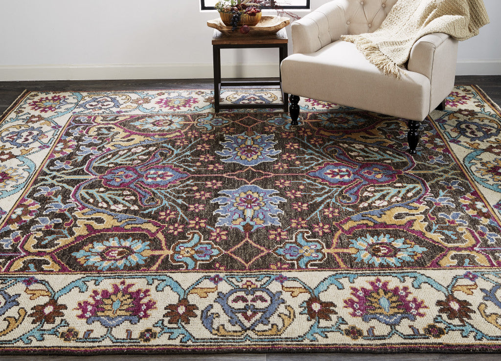 5' X 8' Ivory Brown And Blue Wool Floral Hand Knotted Distressed Stain Resistant Area Rug With Fringe