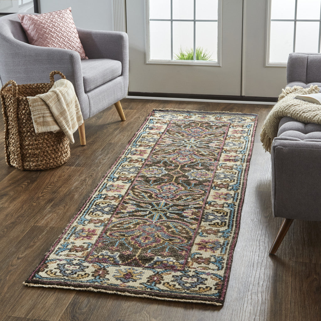 5' X 8' Ivory Brown And Blue Wool Floral Hand Knotted Distressed Stain Resistant Area Rug With Fringe