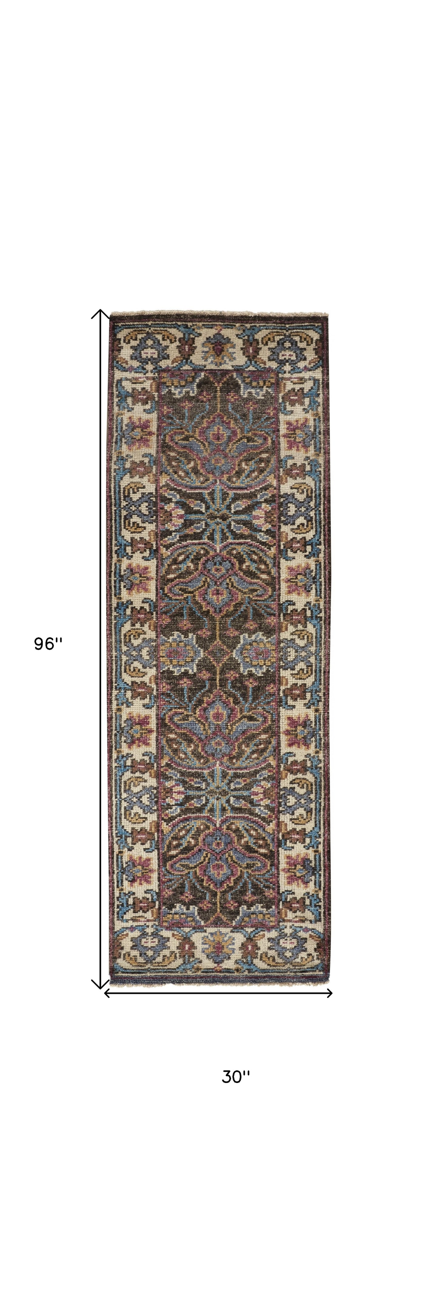 5' X 8' Ivory Brown And Blue Wool Floral Hand Knotted Distressed Stain Resistant Area Rug With Fringe