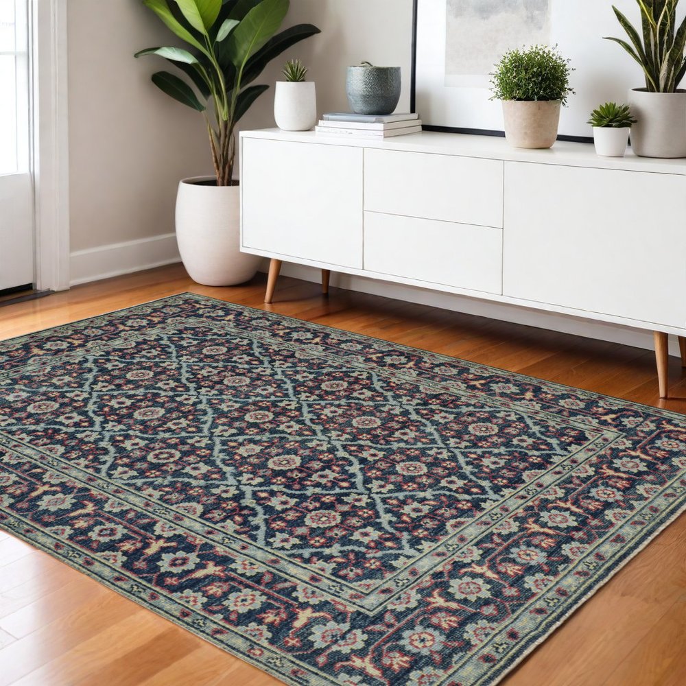 8' X 10' Blue Green And Red Wool Floral Hand Knotted Distressed Stain Resistant Area Rug With Fringe