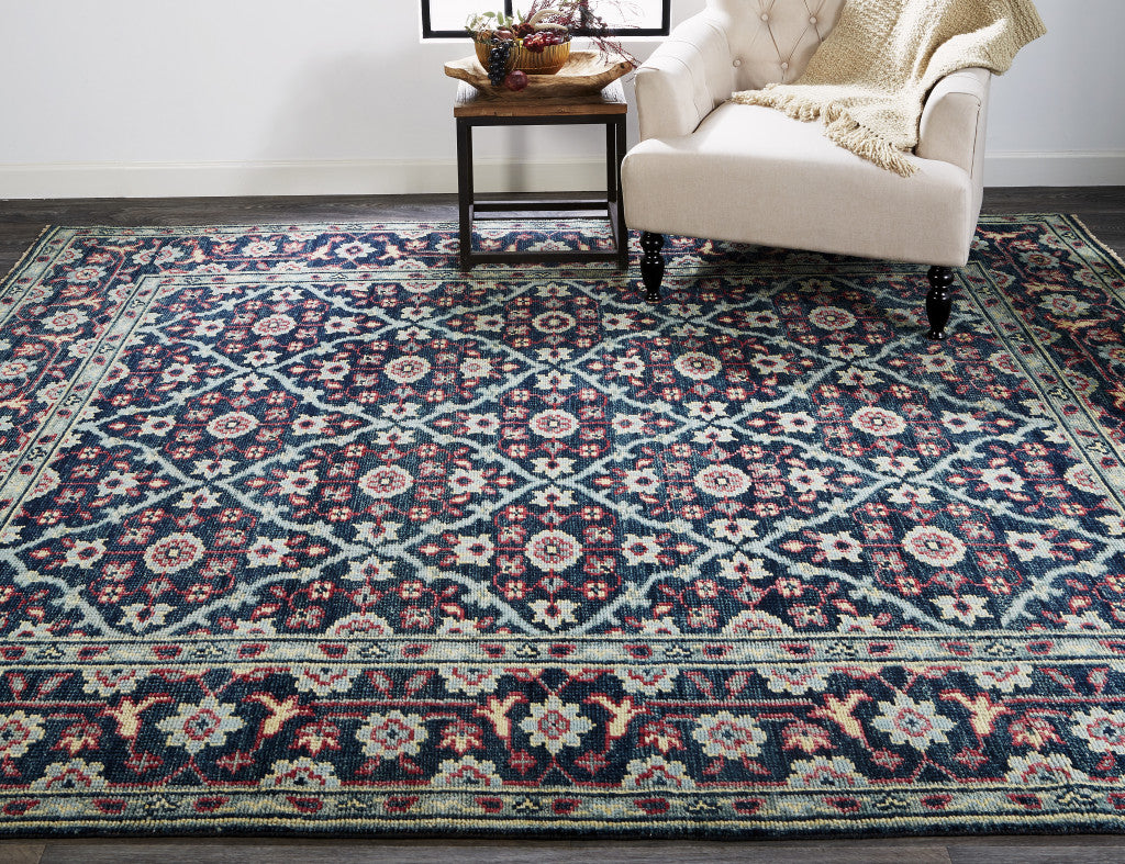 8' X 10' Blue Green And Red Wool Floral Hand Knotted Distressed Stain Resistant Area Rug With Fringe