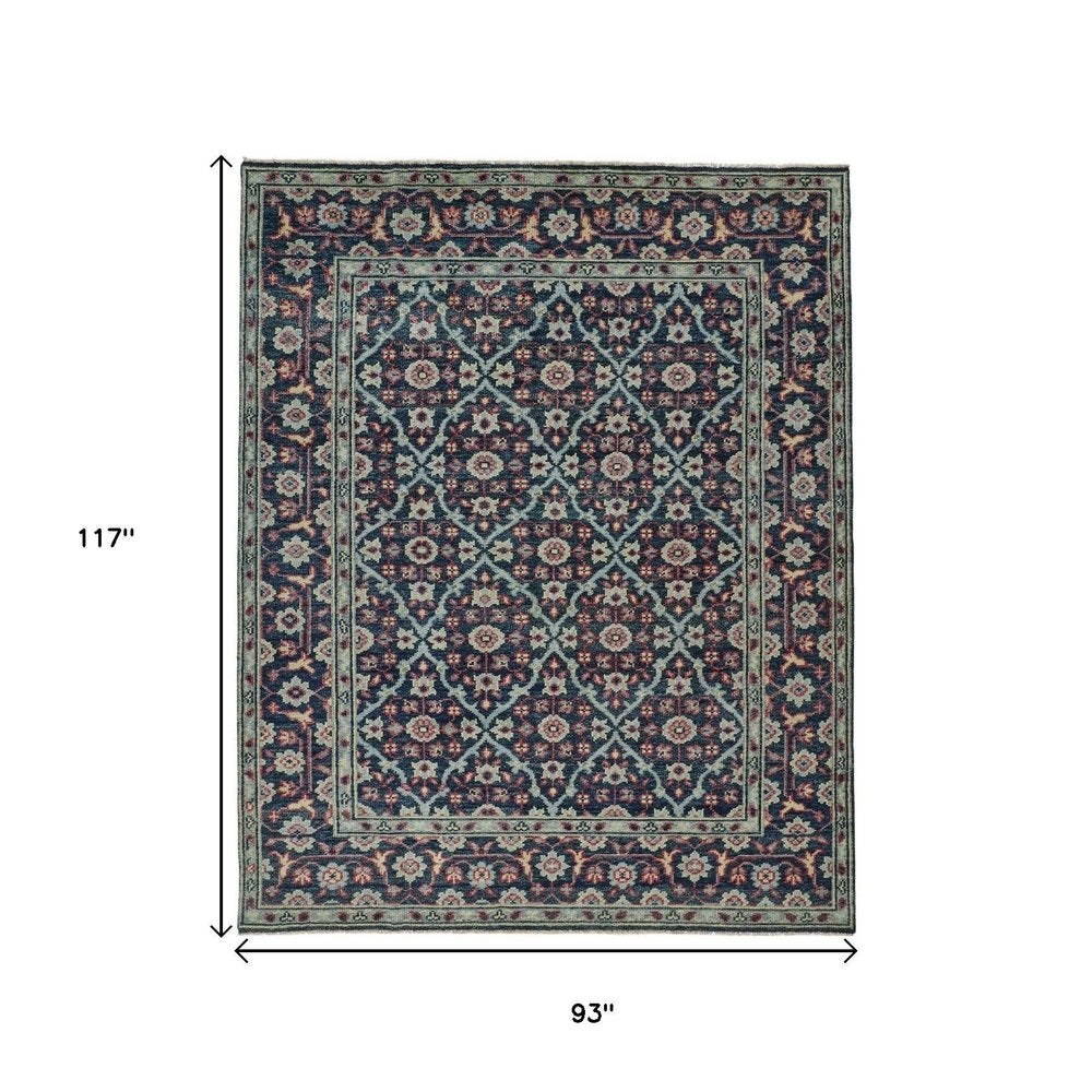 8' X 10' Blue Green And Red Wool Floral Hand Knotted Distressed Stain Resistant Area Rug With Fringe