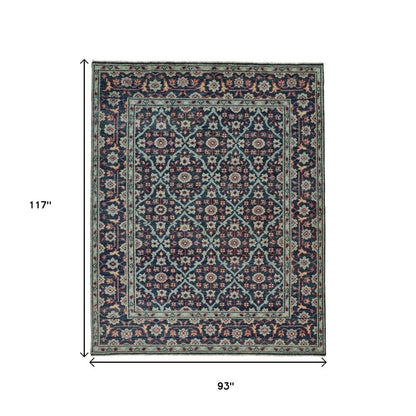 8' X 10' Blue Green And Red Wool Floral Hand Knotted Distressed Stain Resistant Area Rug With Fringe