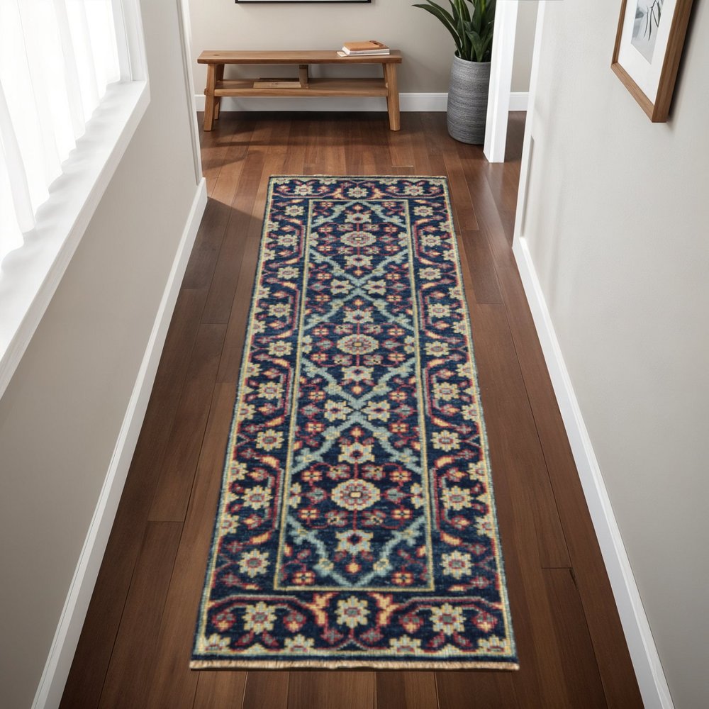 8' X 10' Blue Green And Red Wool Floral Hand Knotted Distressed Stain Resistant Area Rug With Fringe