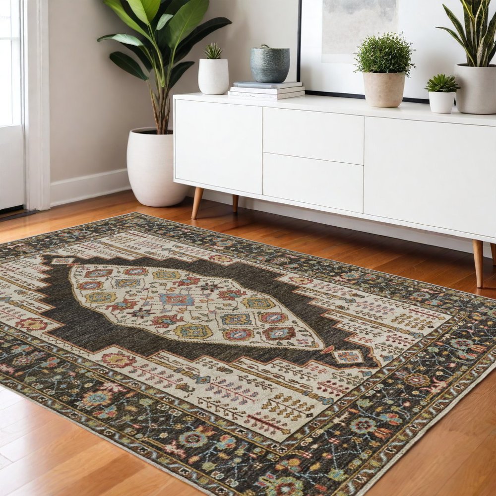 2' X 3' Green and Ivory Wool Floral Hand Knotted Distressed Area Rug With Fringe