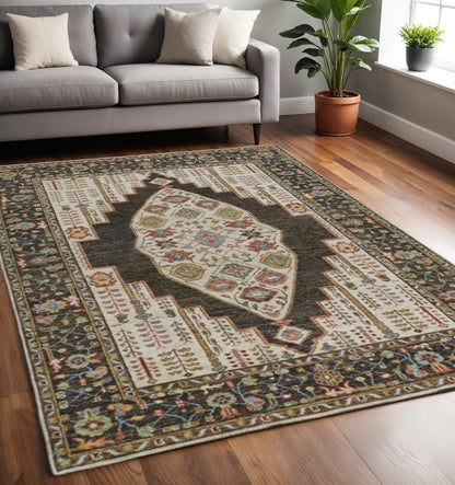 2' X 3' Green and Ivory Wool Floral Hand Knotted Distressed Area Rug With Fringe