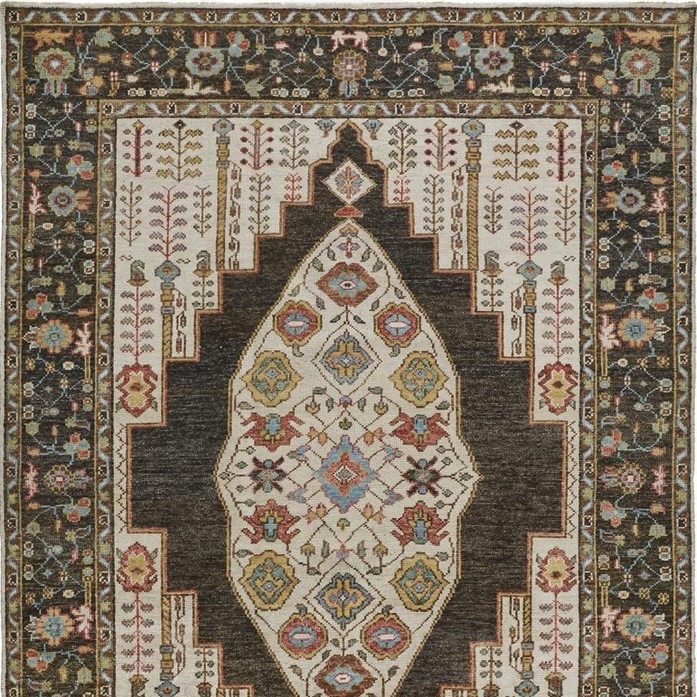 2' X 3' Green and Ivory Wool Floral Hand Knotted Distressed Area Rug With Fringe