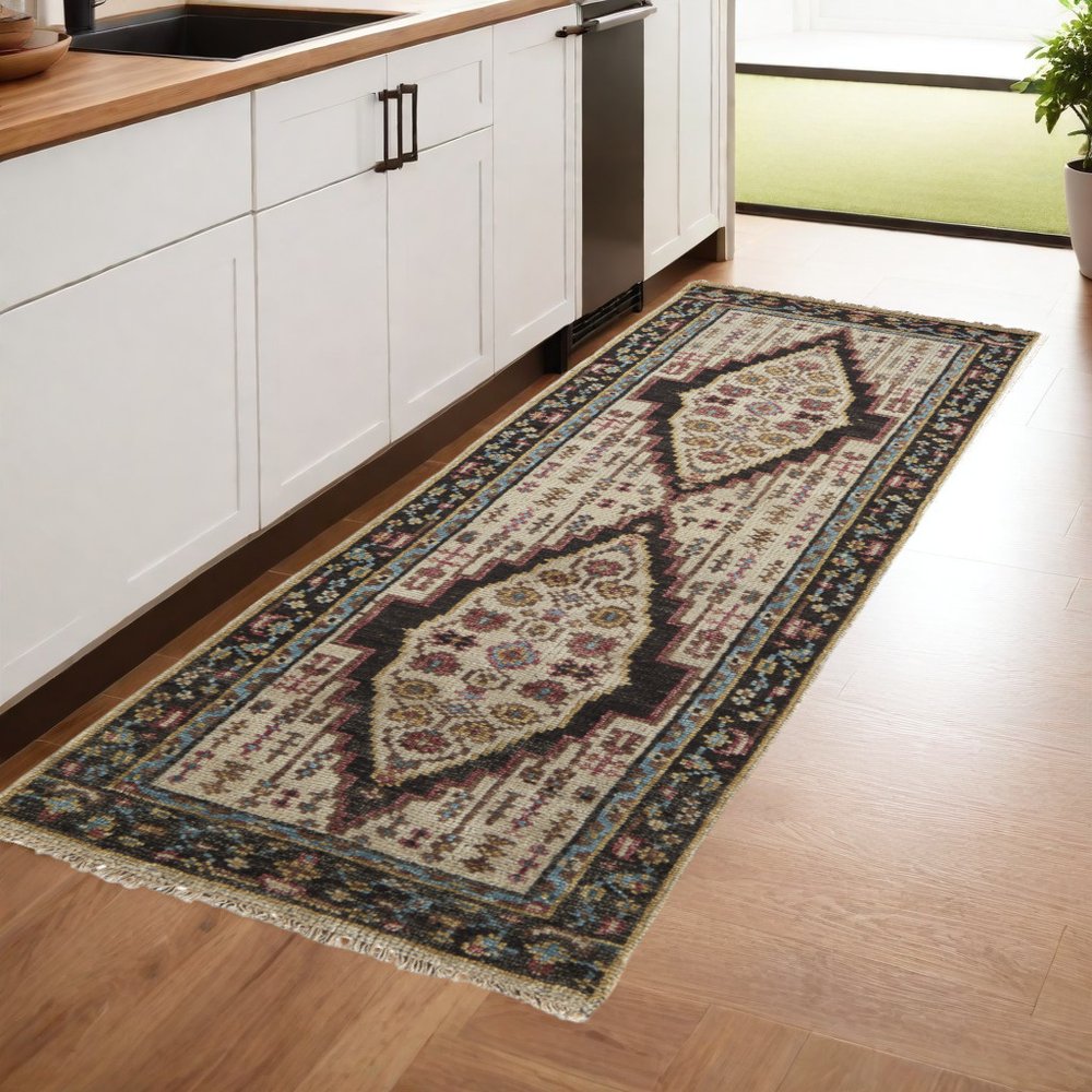 2' X 3' Green and Ivory Wool Floral Hand Knotted Distressed Area Rug With Fringe