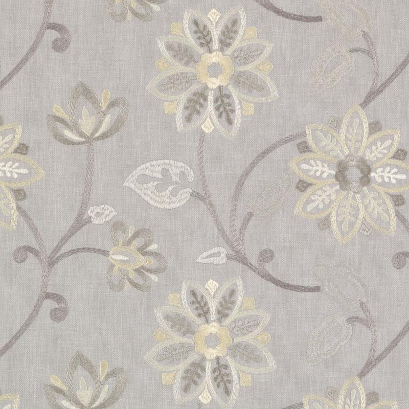 Gray linen-textured fabric with muted yellow, beige and lavender-gray embroidered florals and curling vines.