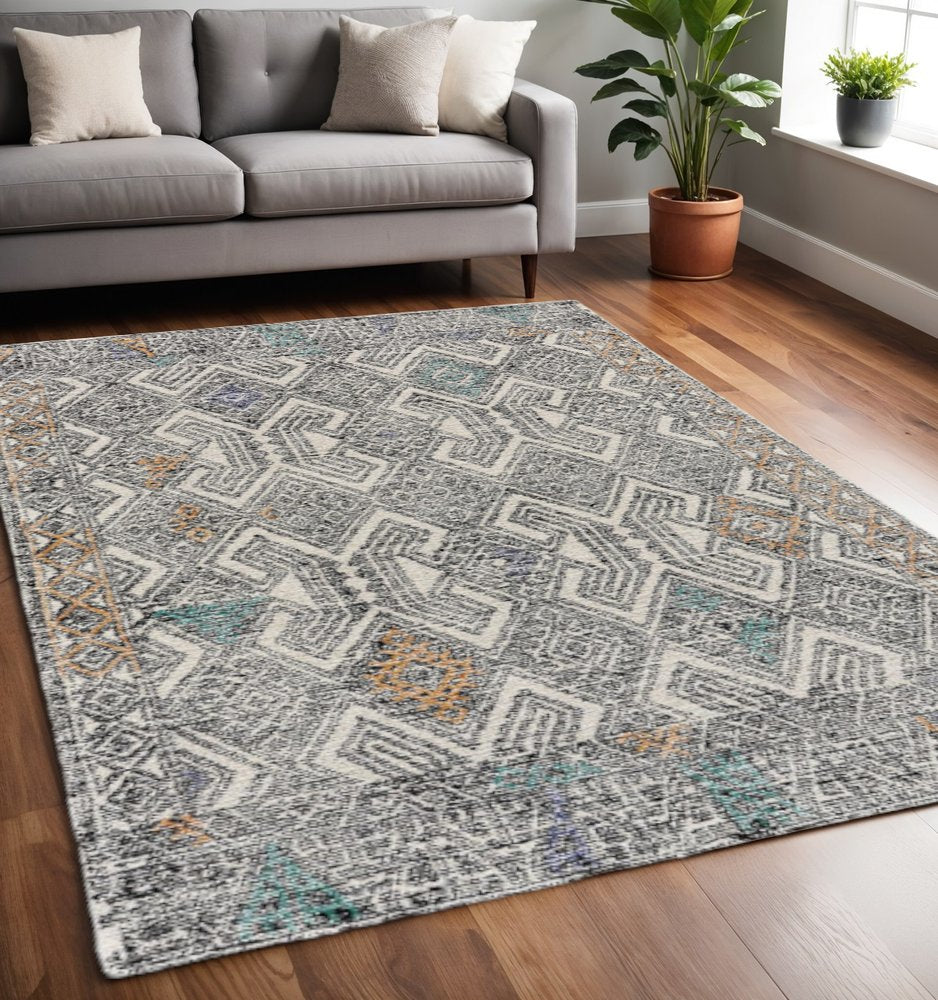 5' X 8' Black Ivory And Green Wool Geometric Tufted Handmade Distressed Area Rug