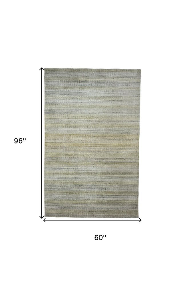2' X 3' Gold Ivory And Gray Abstract Stain Resistant Area Rug