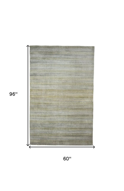 2' X 3' Gold Ivory And Gray Abstract Stain Resistant Area Rug