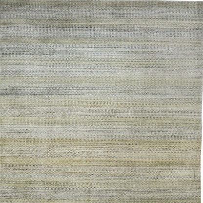 2' X 3' Gold Ivory And Gray Abstract Stain Resistant Area Rug