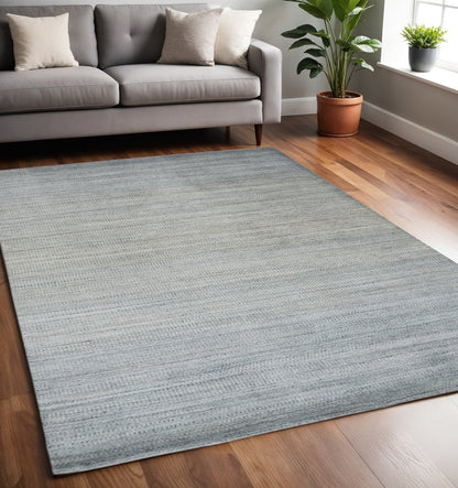 7' X 10' Gold Ivory and Gray Abstract Area Rug