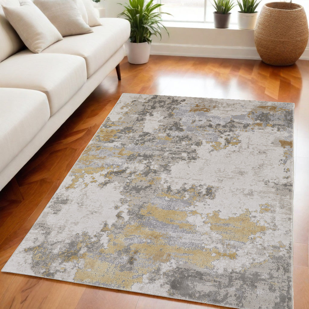 5' X 8' Ivory Gold And Gray Abstract Stain Resistant Area Rug