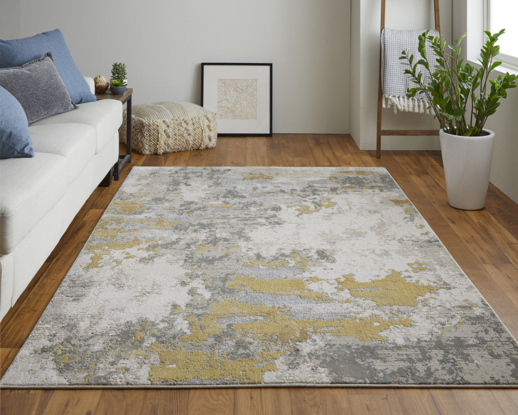 5' X 8' Ivory Gold And Gray Abstract Stain Resistant Area Rug