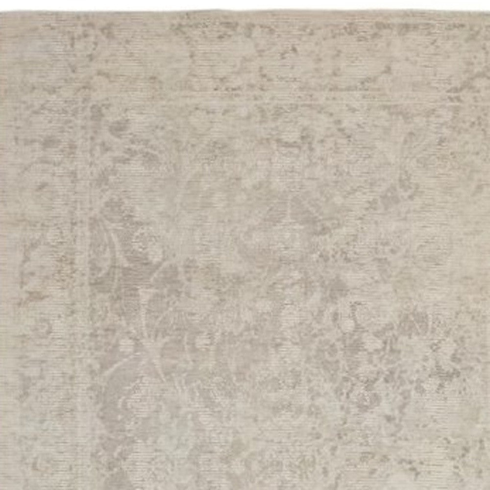 2' X 3' Ivory Blue And Tan Abstract Hand Woven Area Rug