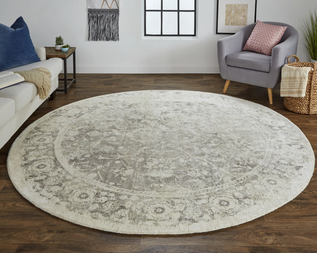 5' X 8' Ivory And Tan Abstract Hand Woven Area Rug