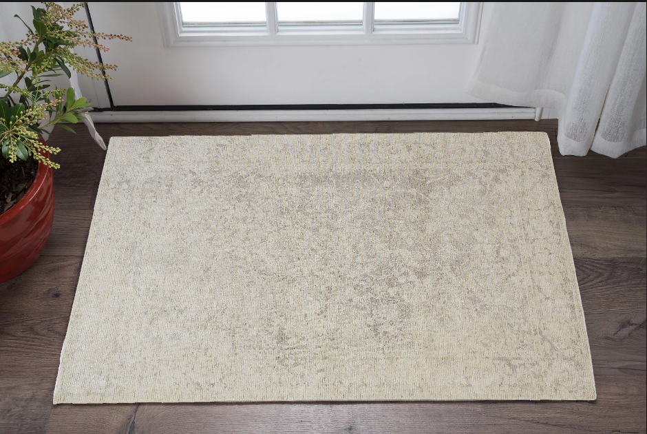 5' X 8' Ivory And Tan Abstract Hand Woven Area Rug