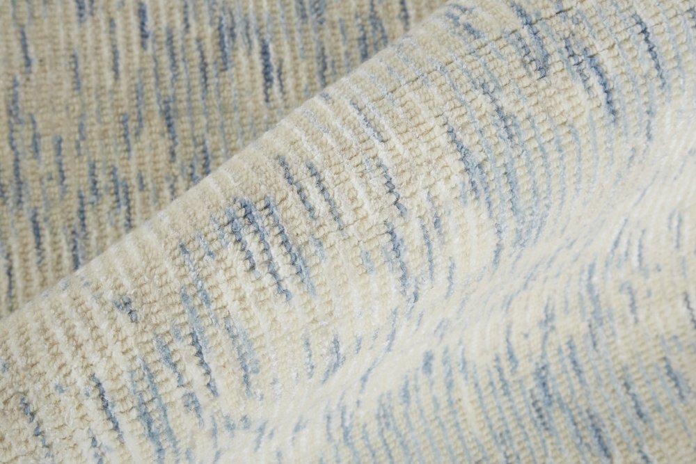 8' Ivory And Gray Round Abstract Hand Woven Area Rug