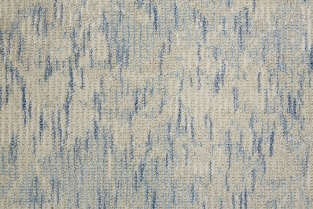 2' X 3' Ivory Blue And Tan Abstract Hand Woven Area Rug