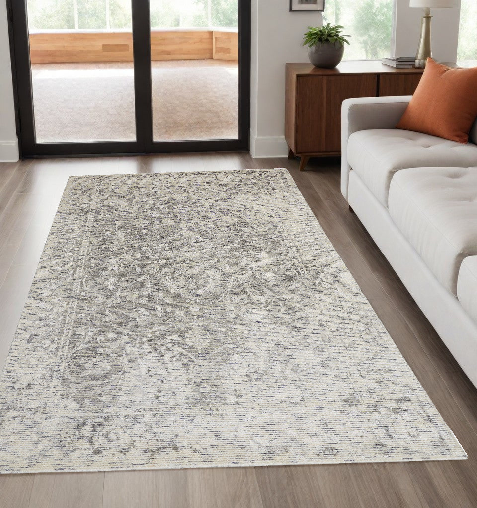 2' X 3' Ivory Blue And Tan Abstract Hand Woven Area Rug