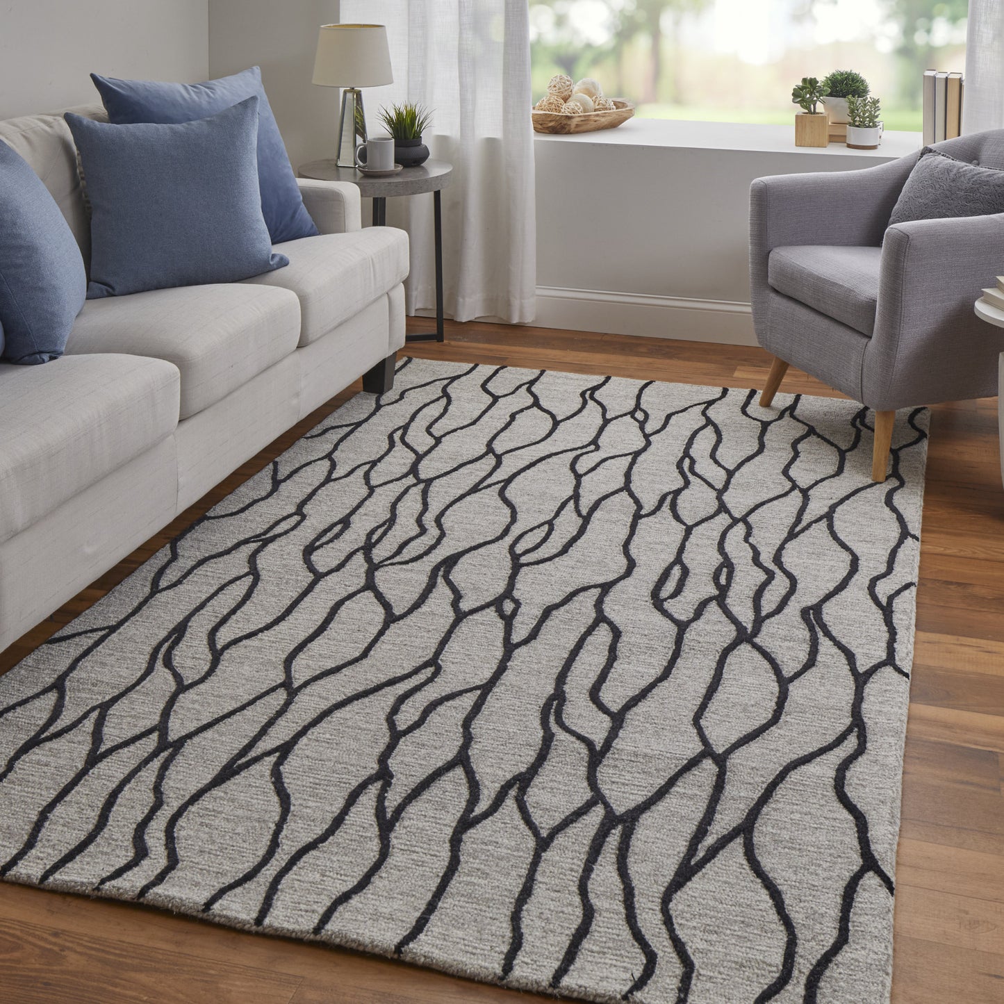 4' X 6' Taupe Black And Gray Wool Abstract Tufted Handmade Stain Resistant Area Rug