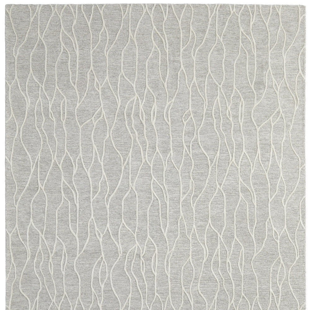 4' X 6' Taupe Black And Gray Wool Abstract Tufted Handmade Stain Resistant Area Rug