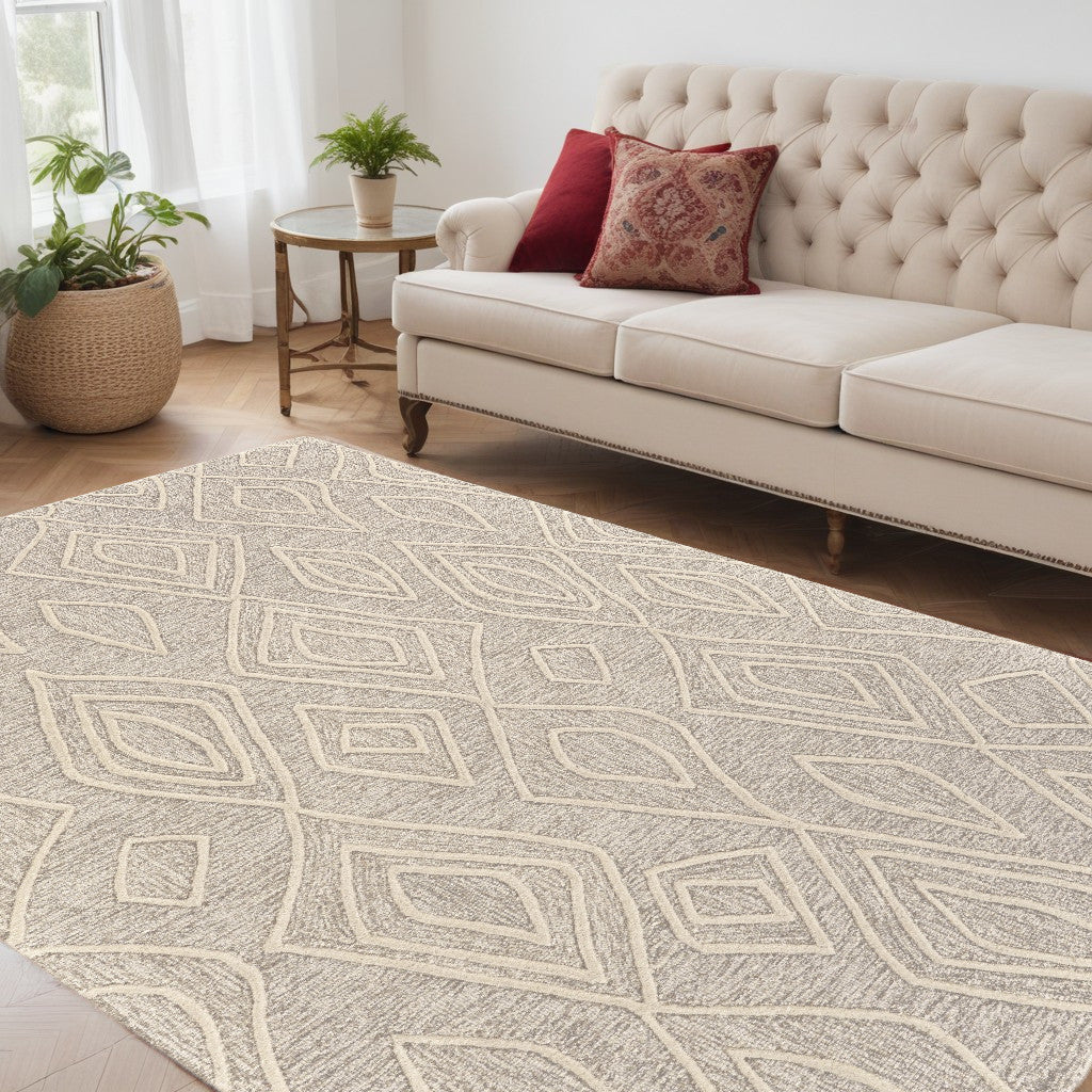 10' X 13' Tan And Ivory Wool Geometric Tufted Handmade Stain Resistant Area Rug