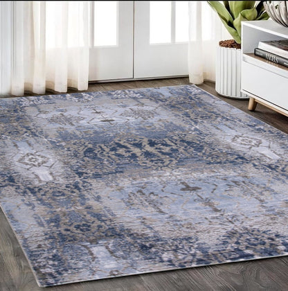 5' X 7' Blue Gray And Taupe Abstract Stain Resistant Area Rug