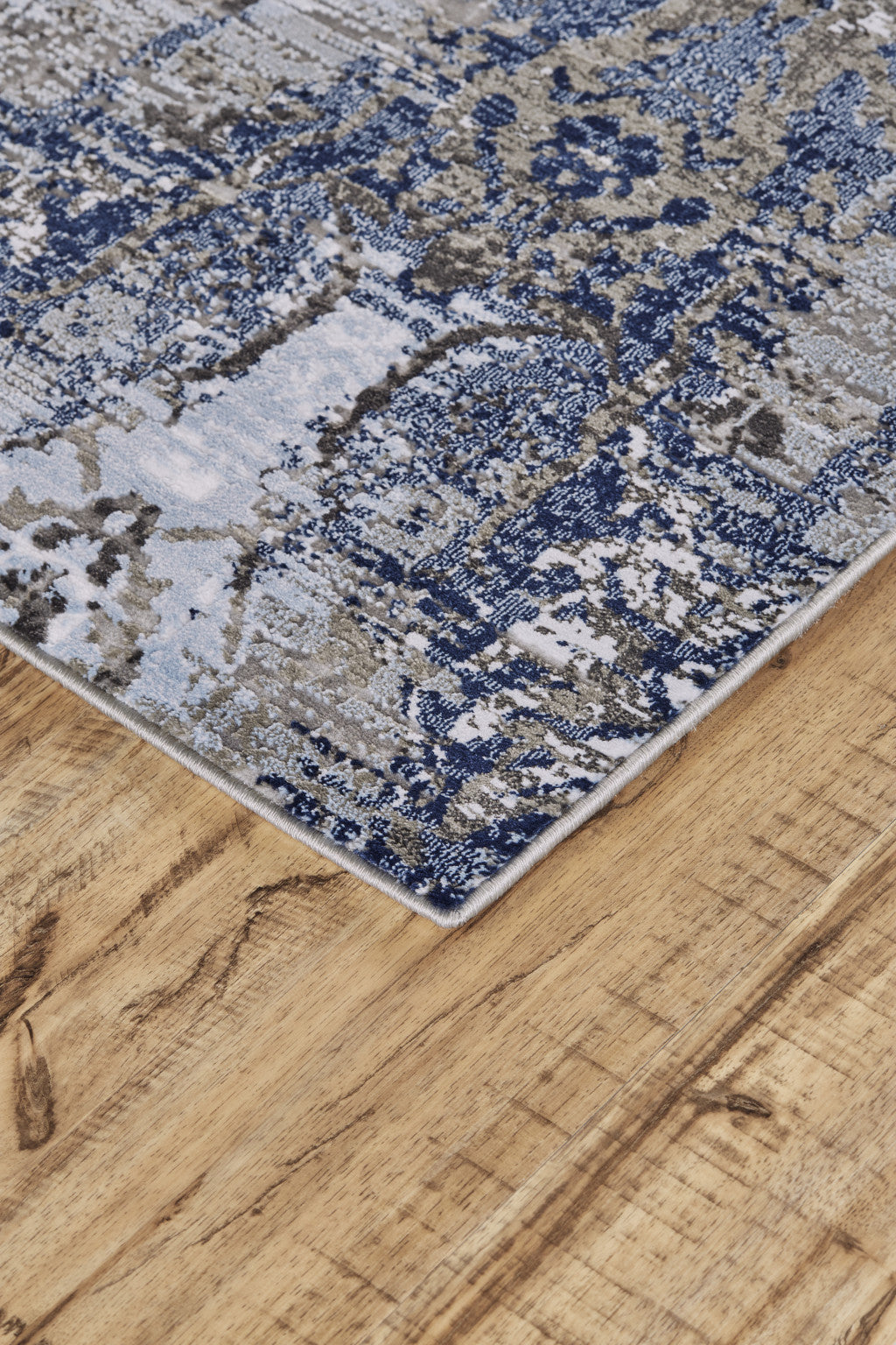 5' X 7' Blue Gray And Taupe Abstract Stain Resistant Area Rug