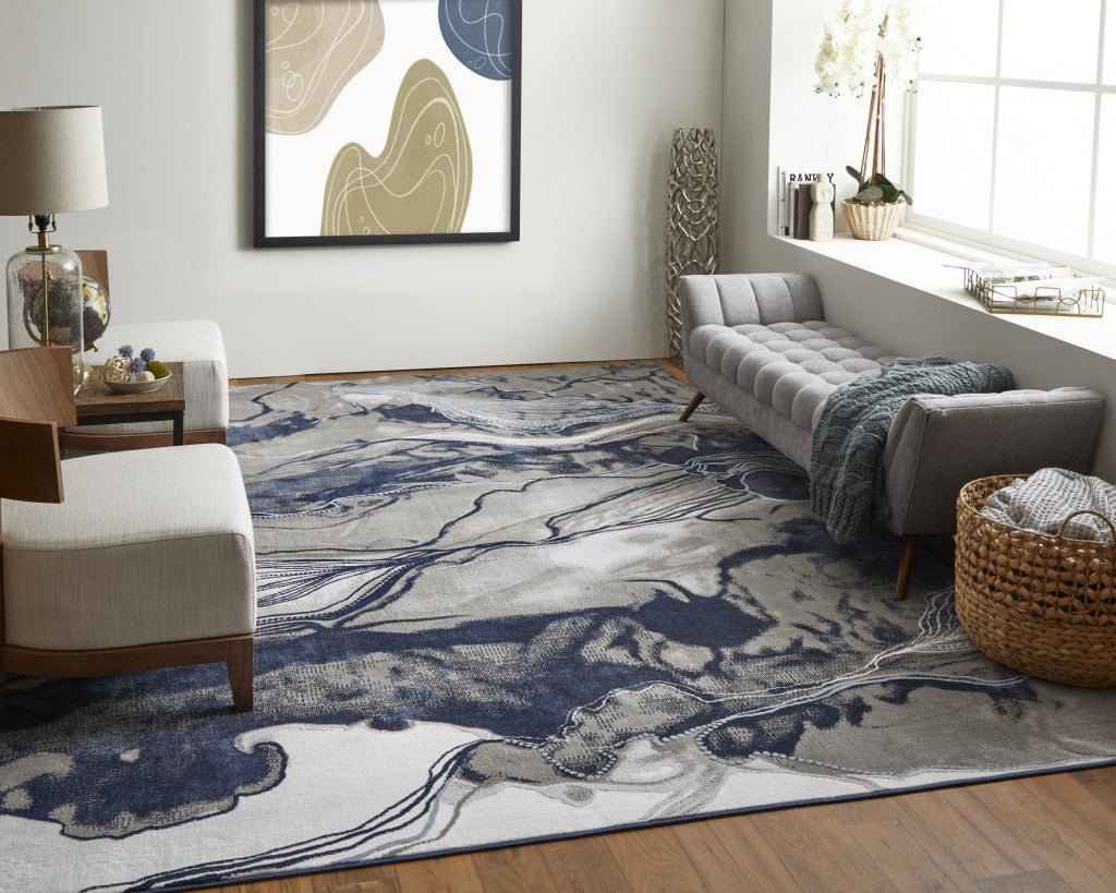 2' X 3' Blue Gray And Ivory Abstract Power Loom Stain Resistant Area Rug