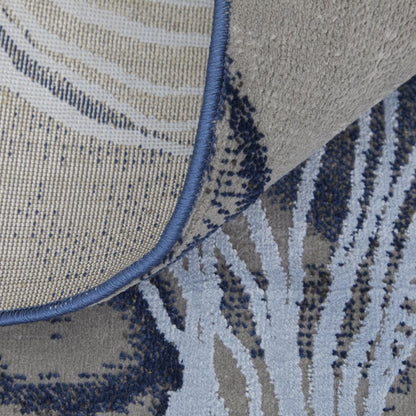 5' X 7' Blue Gray And Ivory Abstract Power Loom Stain Resistant Area Rug
