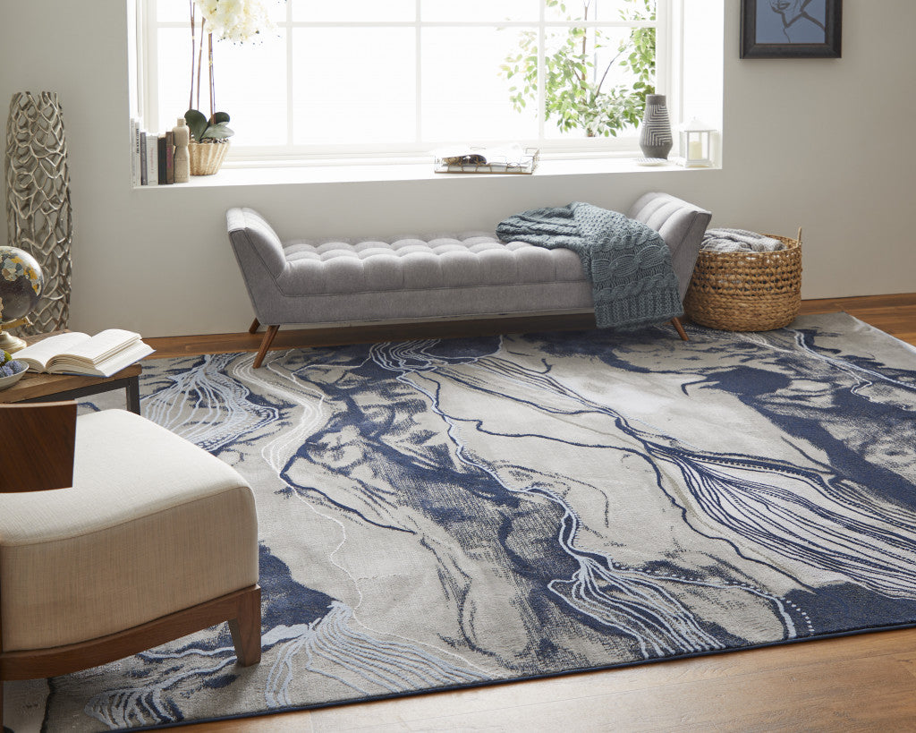 2' X 3' Blue Gray And Ivory Abstract Power Loom Stain Resistant Area Rug