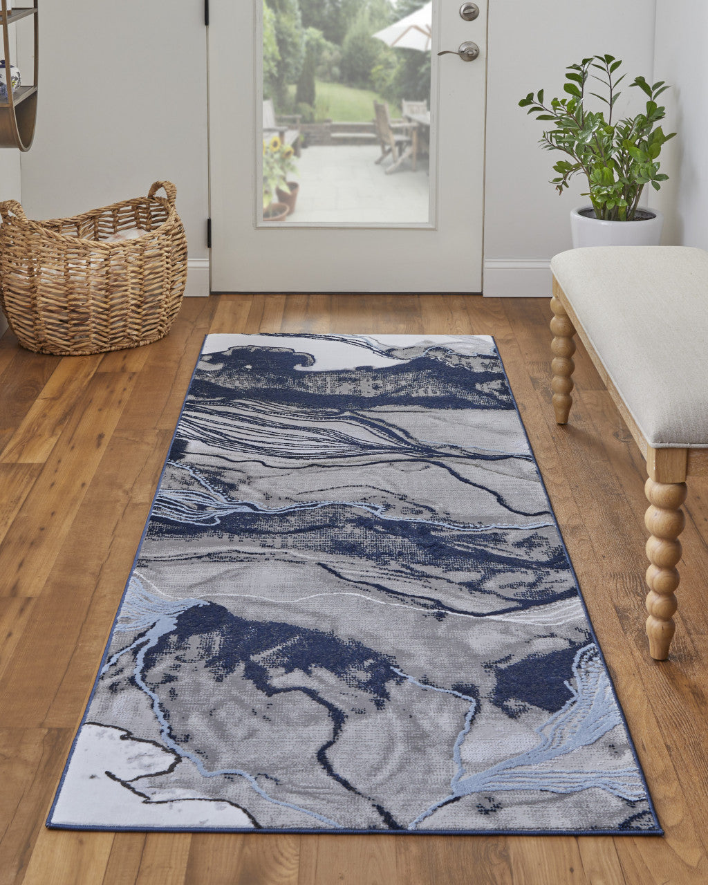 2' X 3' Blue Gray And Ivory Abstract Power Loom Stain Resistant Area Rug