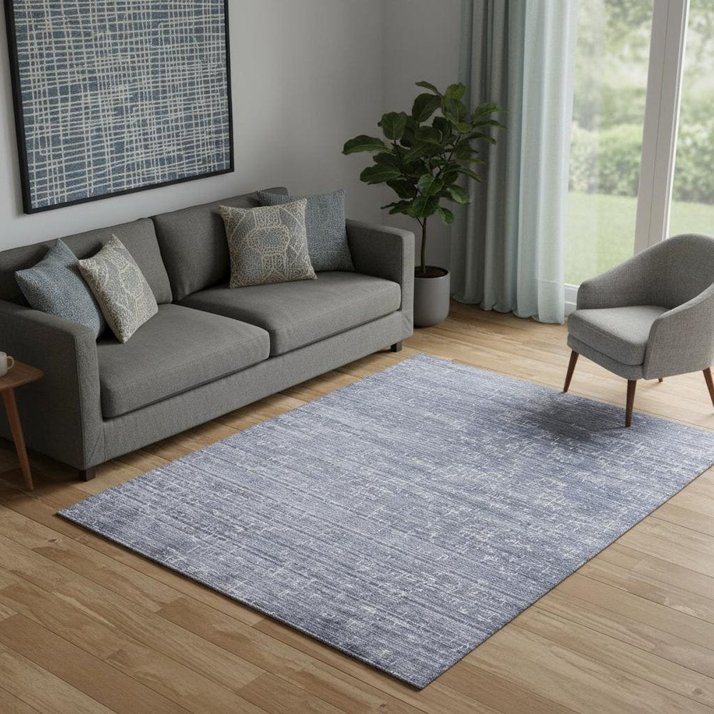 5' X 8' Blue And Ivory Abstract Hand Woven Area Rug