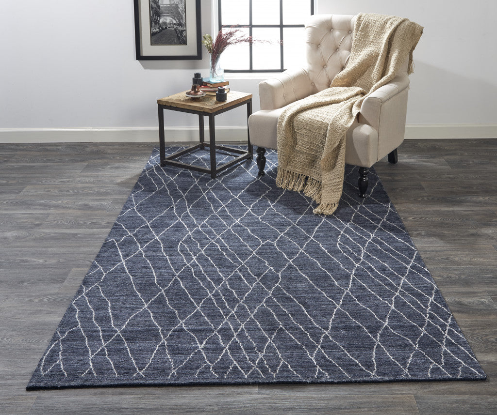 4' X 6' Blue And Ivory Abstract Hand Woven Area Rug