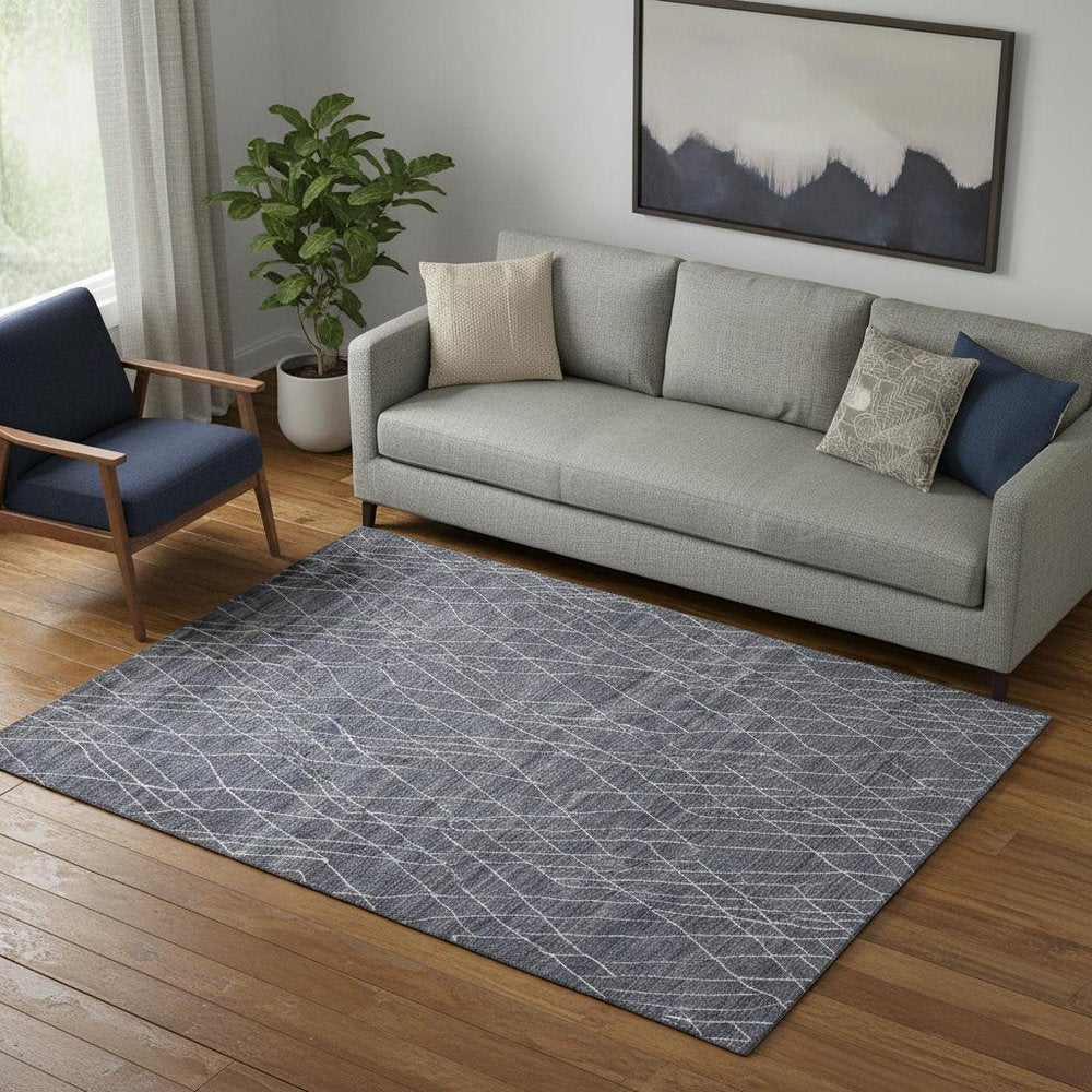 5' X 8' Blue And Ivory Abstract Hand Woven Area Rug