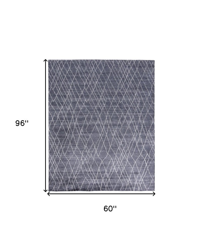 2' X 3' Blue and Ivory Abstract Hand Woven Area Rug