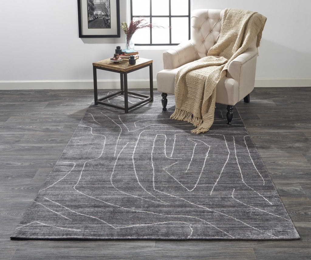 5' X 8' Gray And Ivory Abstract Hand Woven Area Rug