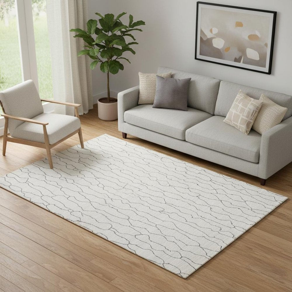 5' X 8' Ivory And Gray Abstract Hand Woven Area Rug