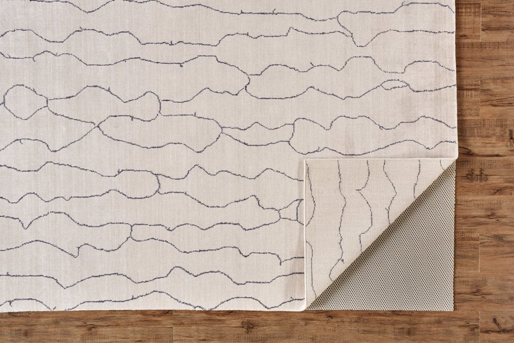 5' X 8' Ivory And Gray Abstract Hand Woven Area Rug